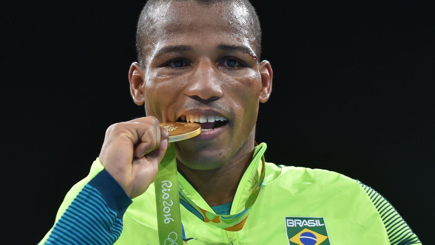 Brazil's Robson Conceicao poses with a gold medal at the Rio 2016 Olympic Games in Rio de Janeiro on August 16, 2016.  