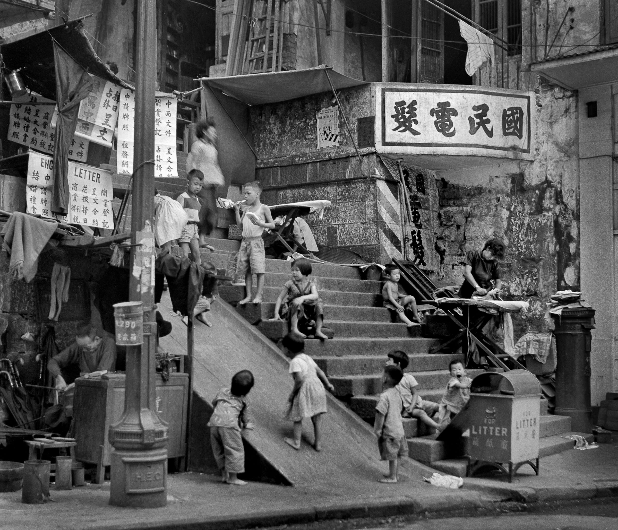 Pictures by legendary  master of Hong Kong street photography, Fan Ho, feature in the exhibition.