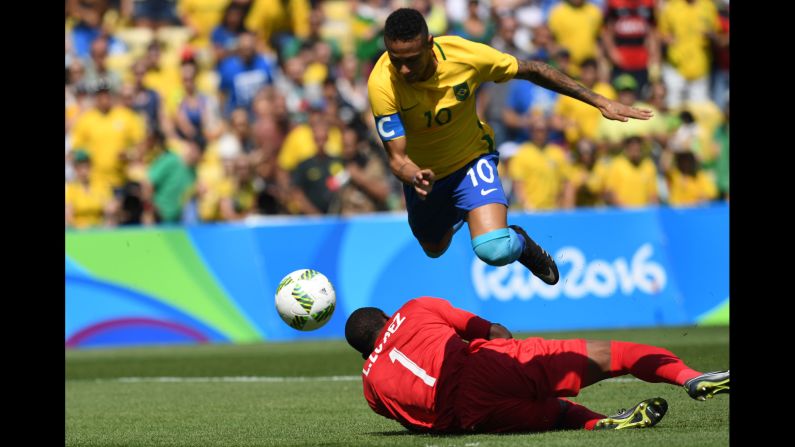 Brazilian soccer star Neymar goes for goal during a semifinal match against Honduras. He scored within the first 15 seconds, and <a href="index.php?page=&url=http%3A%2F%2Fwww.cnn.com%2F2016%2F08%2F17%2Fsport%2Fbrazil-beats-honduras-to-set-up-rematch-with-germany-in-olympic-final%2Findex.html" target="_blank">Brazil won 6-0.</a>