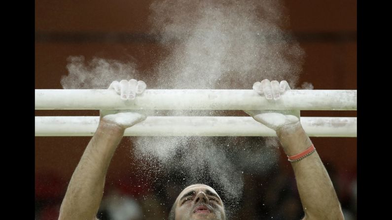 U.S. gymnast Danell Leyva prepares for his performance on the parallel bars during the exhibition gala. Leyva won silver on the apparatus on Tuesday.