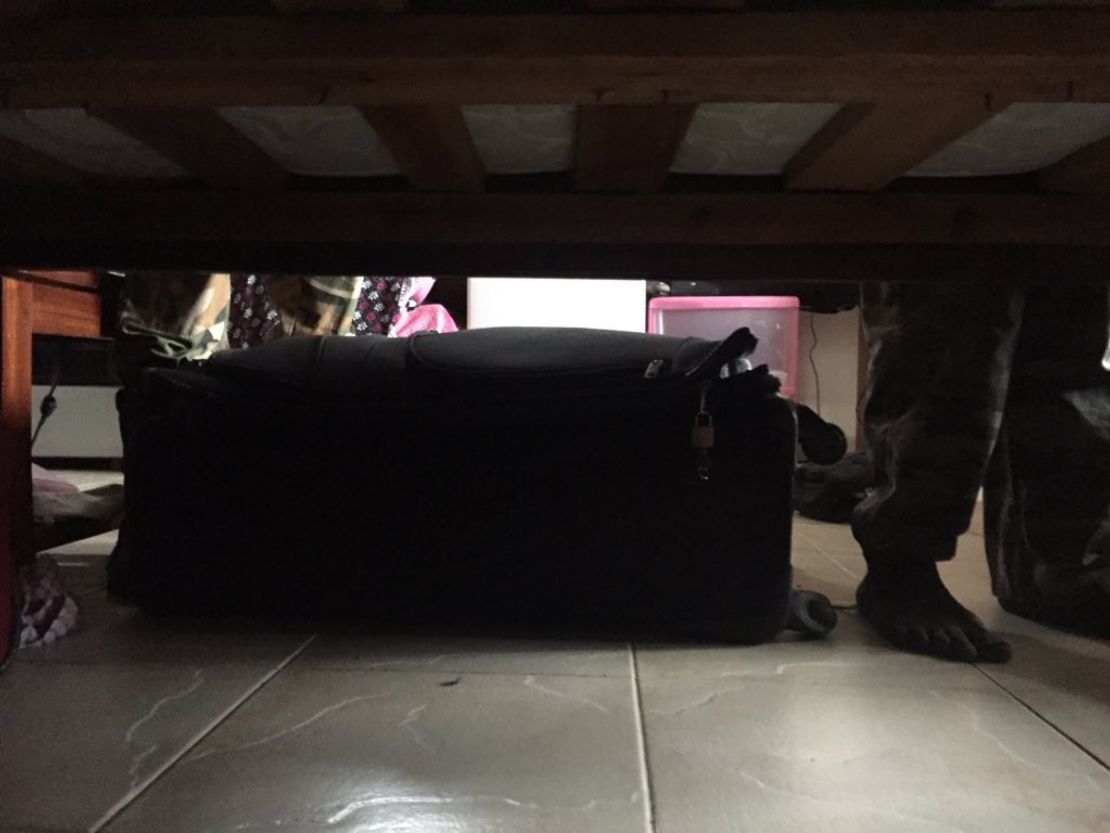 Aid worker Gian Libot hid under his bed; the foot of one of the attackers can be seen on the right.