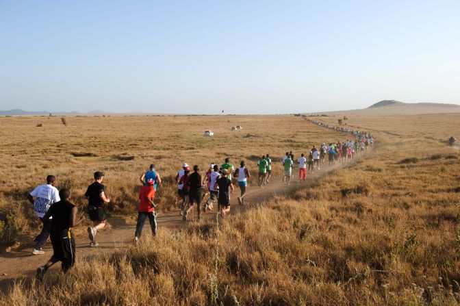 Runners participate in the fast-growing Safaricom Lewa marathon in Kenya. The government is targeting the lucrative sports tourism sector as an engine of economic recovery. 