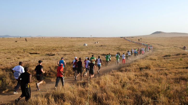 Runners participate in the fast-growing Safaricom Lewa marathon in Kenya. The government is targeting the lucrative sports tourism sector as an engine of economic recovery. 