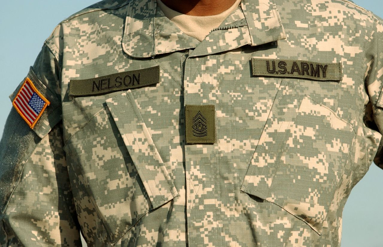 The Army Combat Uniform, displayed in 2005, includes a universal camouflage pattern with moisture wicking, intended to provide functionality and good ergonomics.  
