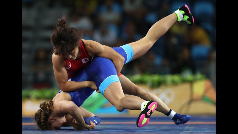 Japanese wrestler Kaori Icho, in red, defeated Russia's Valeria Koblova for the gold medal in the 58-kilogram (128-pound) weight class. It was the <a href="index.php?page=&url=http%3A%2F%2Fwww.cnn.com%2F2016%2F08%2F17%2Fsport%2Fkaori-icho-wrestling-rio%2Findex.html" target="_blank">fourth straight Olympic gold medal</a> for Icho, who became the first female in any sport to win an individual-event gold at four Olympics.