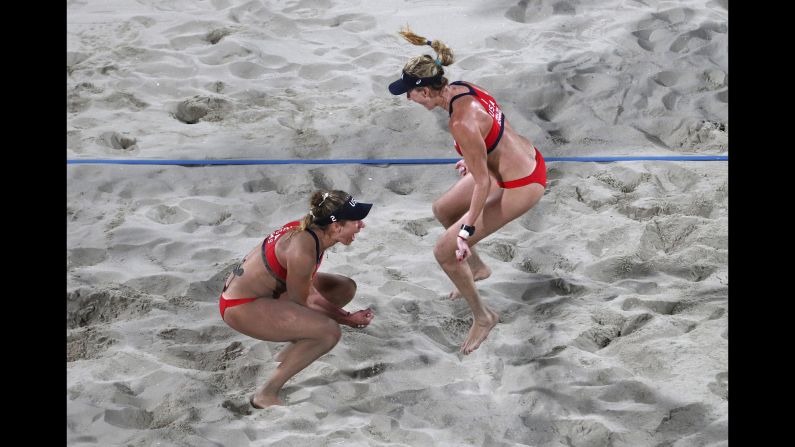 U.S. beach volleyball players April Ross, left, and Kerri Walsh Jennings celebrate their bronze-medal win over Brazil's Larissa Franca and Talita Antunes.