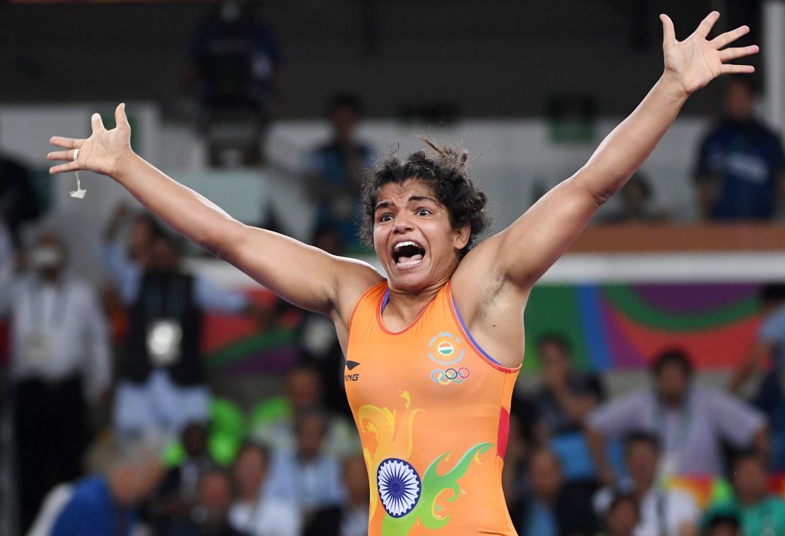 India's Malik celebrated after winning bronze in Rio.