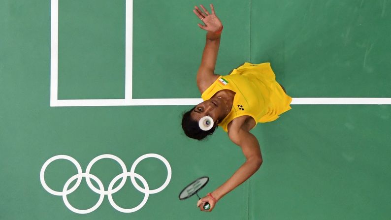 Indian badminton player P. V. Sindhu plays a semifinal match against Japan's Nozomi Okuhara. Sindhu won, and she will face Spain's Carolina Marin in the gold-medal match on Friday.