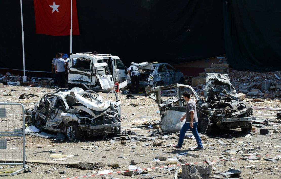 Turkish rescue workers at the scene of a car bomb attack on a police station in the eastern city of Elazig Thursday.