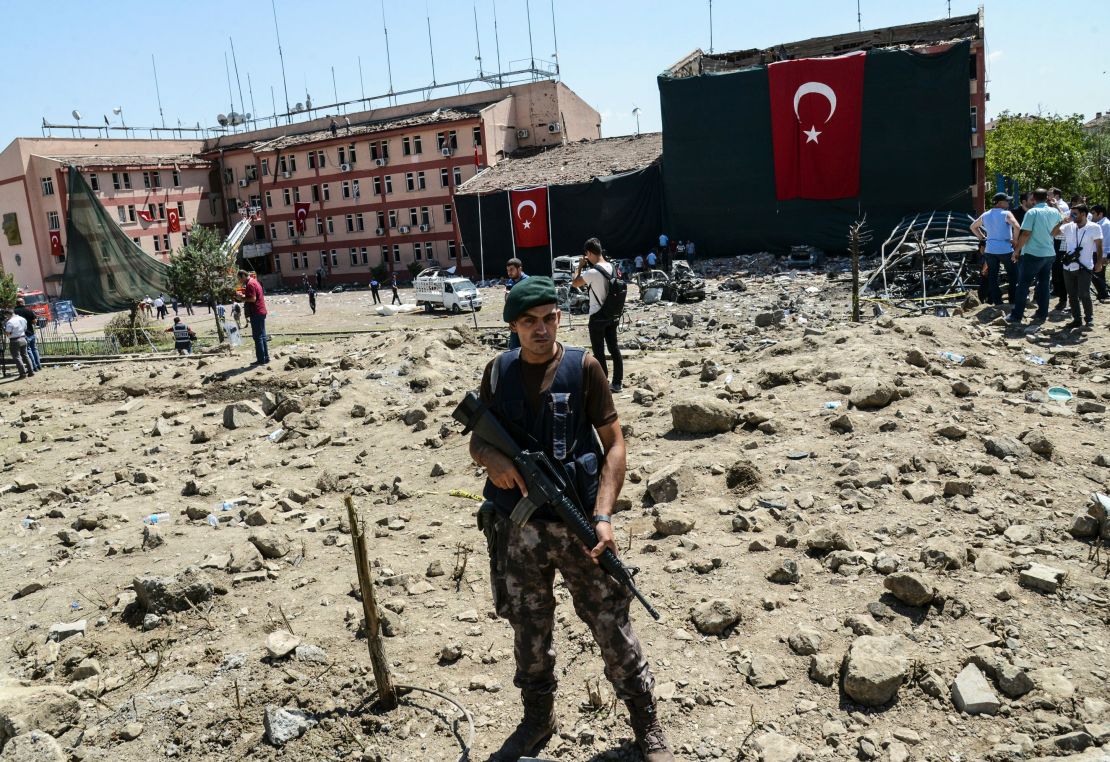 A Turkish soldier stands guard at the scene of the blast in Elazig.