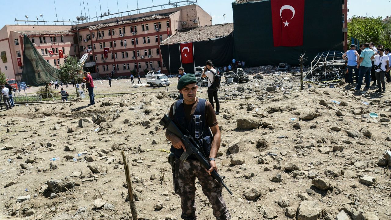 A Turkish soldier stands guard at the scene of the blast in Elazig.