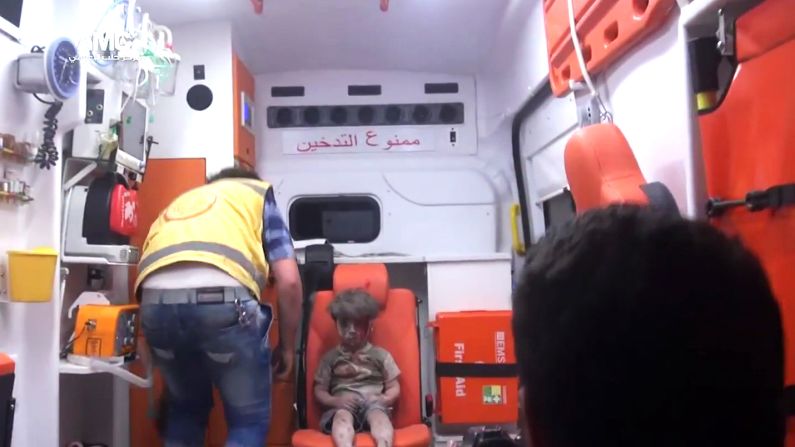The bloodied boy sits and waits for medical attention. An Aleppo Media Center activist <a href="index.php?page=&url=http%3A%2F%2Fwww.cnn.com%2F2016%2F08%2F17%2Fworld%2Fsyria-little-boy-airstrike-victim%2Findex.html" target="_blank">told CNN</a> that Omran did not cry at any point during the rescue and appeared to be in extreme shock.