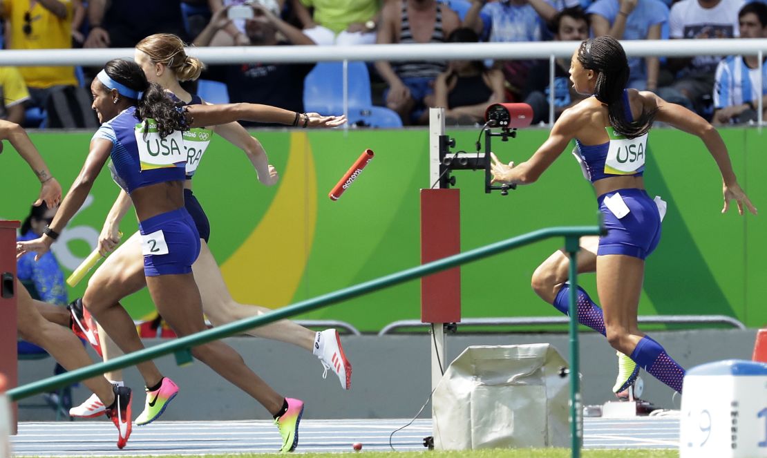 English Gardner and Allyson Felix, right, from the United States, drop the baton in the women's 4x100-meter relay heat. 