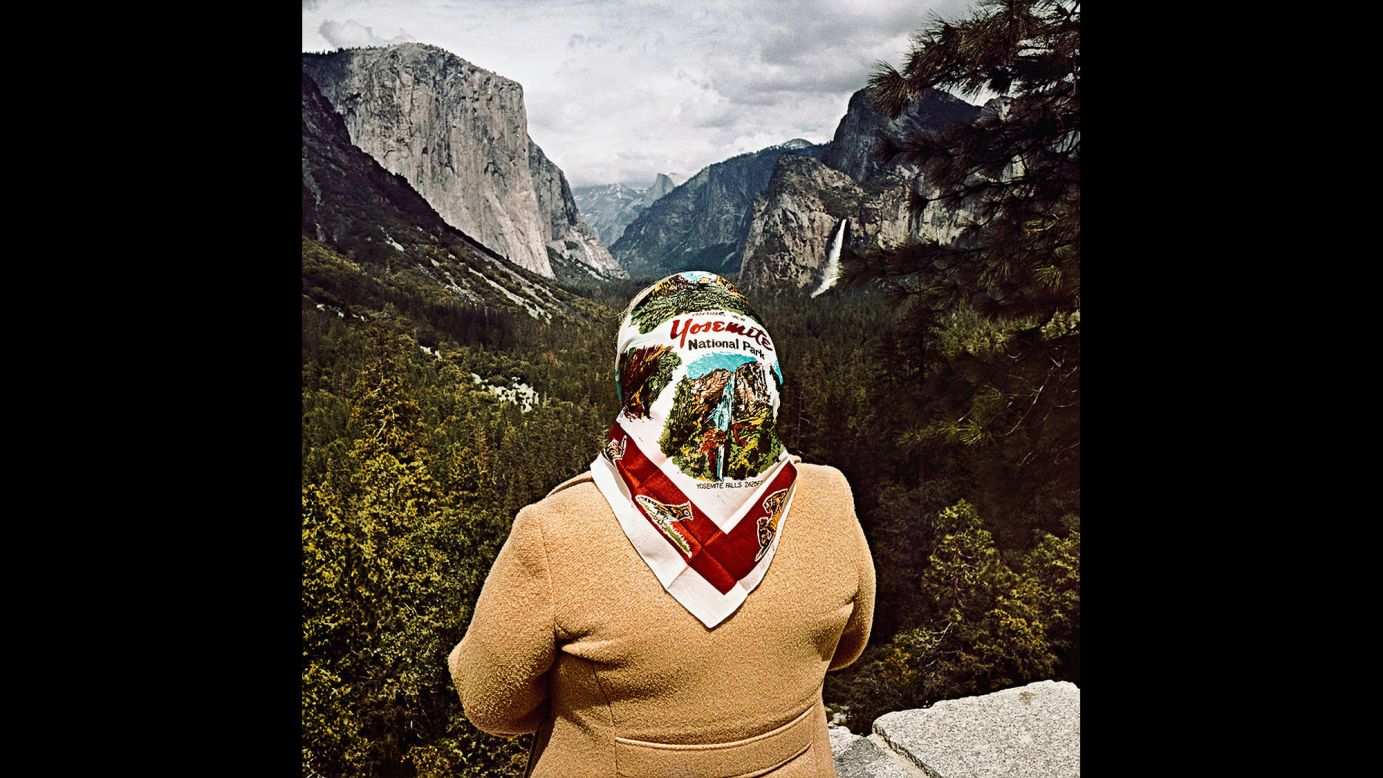 <em>Woman with Scarf at Inspiration Point, Yosemite National Park, California, 1980.</em> Minick got interested in the phenomenon of sightseeing while observing tourists at scenic overlooks in the American West.