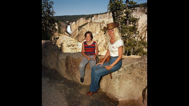 <em>Mother & Son at Lower Falls Overlook, Yellowstone National Park, 1980. </em>Minick used a hand-held camera for the project to allow for more spontaneity.