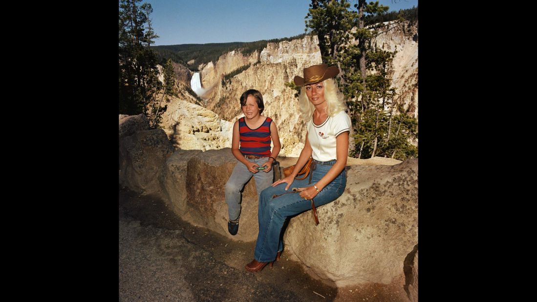 <em>Mother & Son at Lower Falls Overlook, Yellowstone National Park, 1980. </em>Minick used a hand-held camera for the project to allow for more spontaneity.