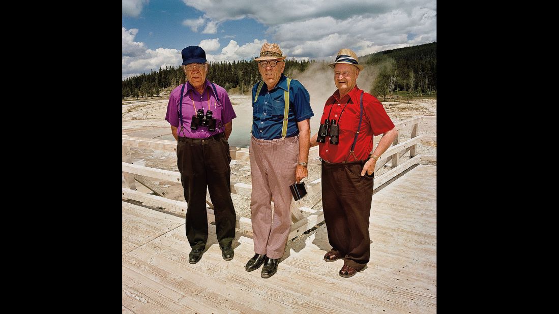 <em>Three Men in Color Coordinated Shirts at Upper Geyser Basin, Yellowstone National Park, Wyoming, 1980.</em> Minick spotted these men from a distance. "I saw those three spots of color and I said, 'Oh my God, that's too good.'"