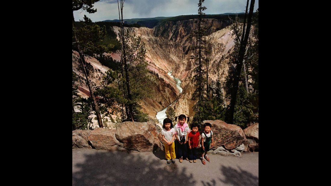 <em>Children at Grand Canyon of the Yellowstone, Yellowstone National Park, Wyoming, 1980. </em>Minick had to work quickly to get his shot before subjects moved on to their next stop.