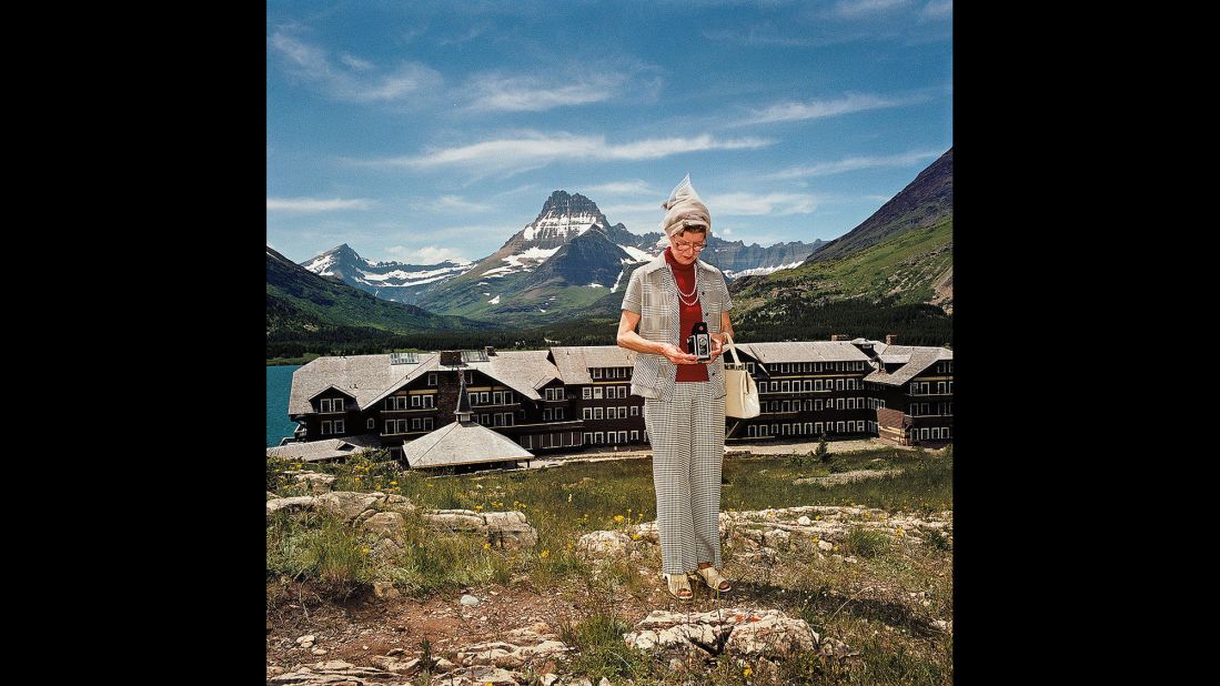 <em>Woman Taking Photograph at Many Glacier Hotel, Glacier National Park, Montana, 1981. </em>Some of the subjects' wardrobe choices were questionable. Not this "very classy lady."