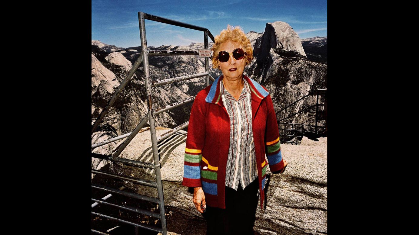 <em>Woman with Red Sweater at Glacier Point, Yosemite National Park, California, 1981. </em>Minick usually approached his subjects at overlooks and asked to take their pictures. He didn't get their names, but he often wonders about the tourists he photographed.