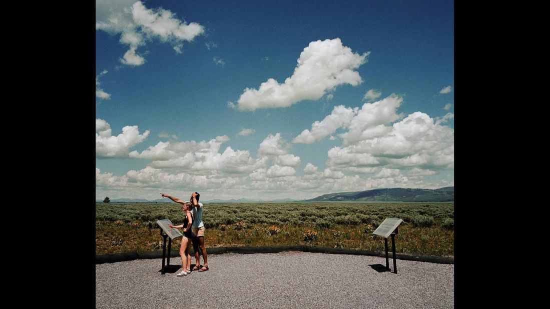 <em>Couple Viewing Grand Tetons, Grand Tetons National Park, Wyoming, 1980. </em>Despite the hot, tired business of tourism, Minick said most of the people he encountered were genuinely awe-struck.