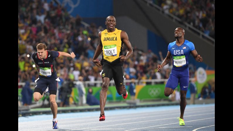 Jamaica's Usain Bolt crosses the finish line <a href="index.php?page=&url=http%3A%2F%2Fwww.cnn.com%2F2016%2F08%2F18%2Fsport%2Fusain-bolt-200m-rio%2Findex.html" target="_blank">to win the 200 meters</a> for the third consecutive Olympics on Thursday, August 18. Bolt has also won three straight golds in the 100 meters.