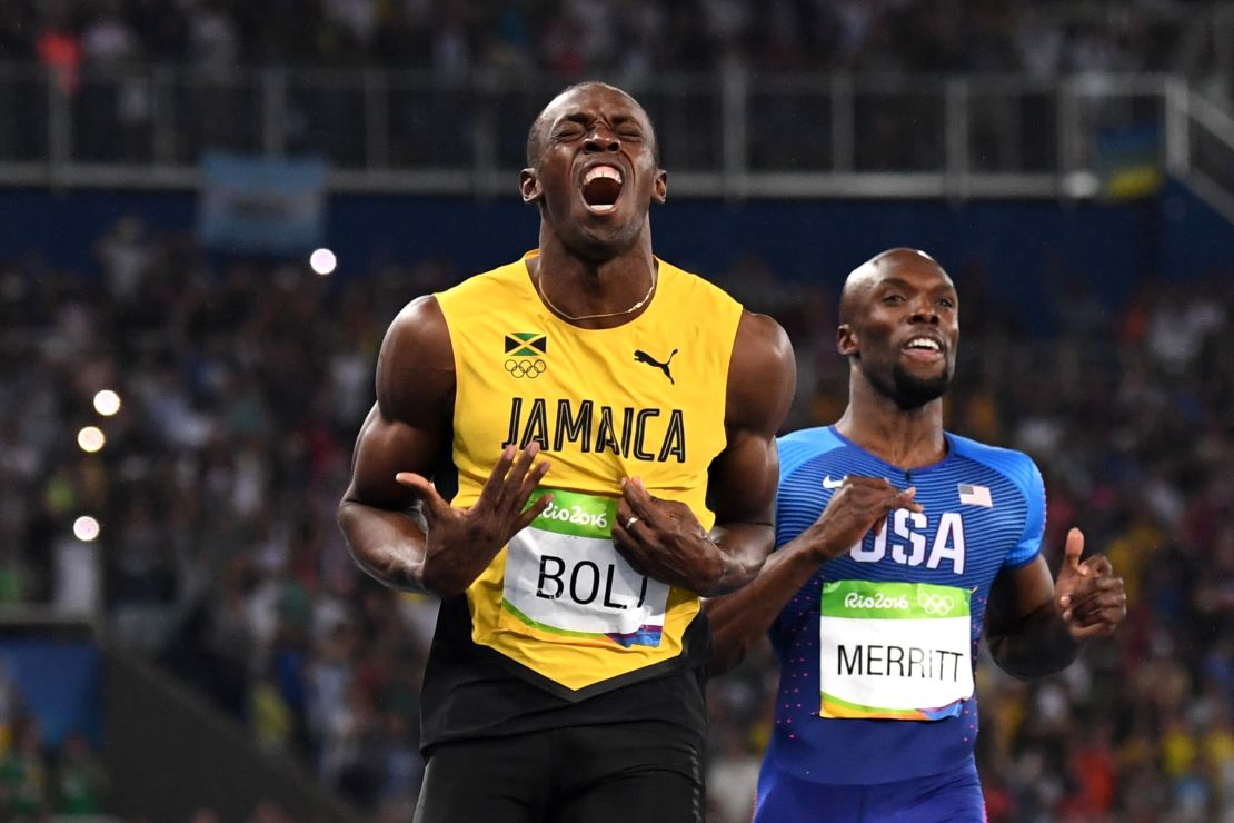 Jamaica's Usain Bolt celebrates after crossing the finish line to win the men's 200m final on August 18.