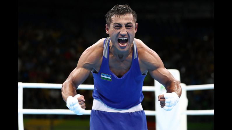 Fazliddin Gaibnazarov, a boxer from Uzbekistan, reacts after he defeated Russia's Vitaly Dunaytsev in the light-welterweight semifinal.