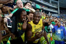 Fans' favorite: Usain Bolt takes time to pose for selfies after winning the 200-meters in Rio