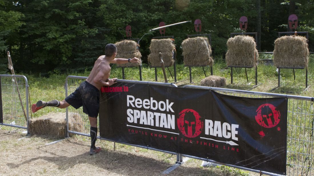 Failure to complete any obstacle results in 30 burpees, strictly enforced by volunteers staffing each obstacle. The spear throw has such a high rate of failure (you get only one shot) that it's basically a burpee station. 