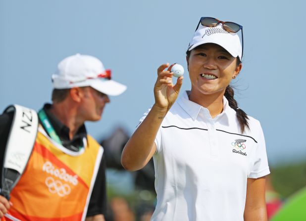 Focus then switched to golf's first inclusion at the Olympics since 1906. Ko poses with the ball she used to make a hole-in-one at the Rio 2016 - her first ever in professional competition. 