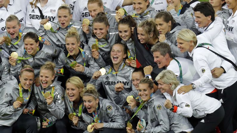 Germany's soccer players pose with their gold medals after <a  target="_blank">defeating Sweden 2-1 in the final.</a>