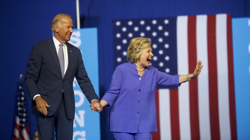 Democratic Presidential candidate Hillary Clinton and US Vice President Joe Biden acknowledge the crowd at Riverfront Sports athletic facility on August 15, 2016 in Scranton, Pennsylvania.