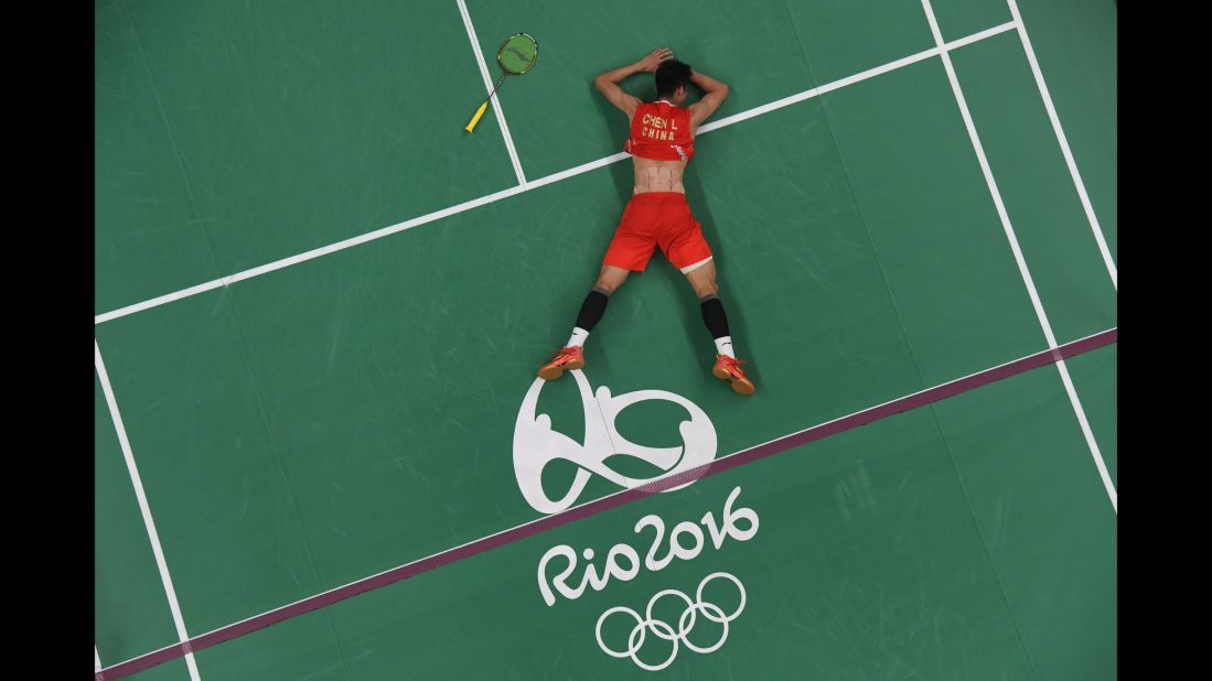 China's Chen Long reacts after winning gold against Malaysia's Lee Chong Wei in their badminton singles match.