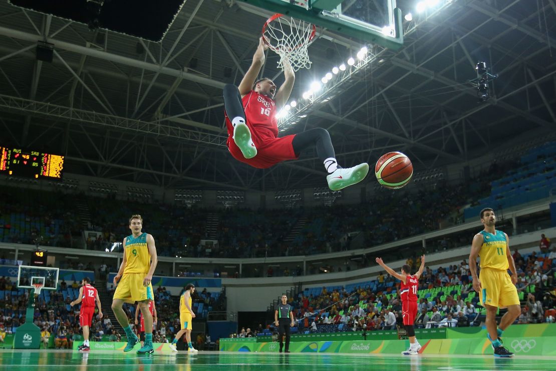 Serbia's Vladimir Stimac slam dunks the ball during the semifinal  against Australia. 