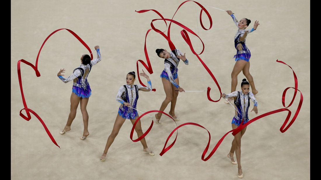 Rhythmic gymnasts from Israel perform their routine during the team all-around qualifications.
