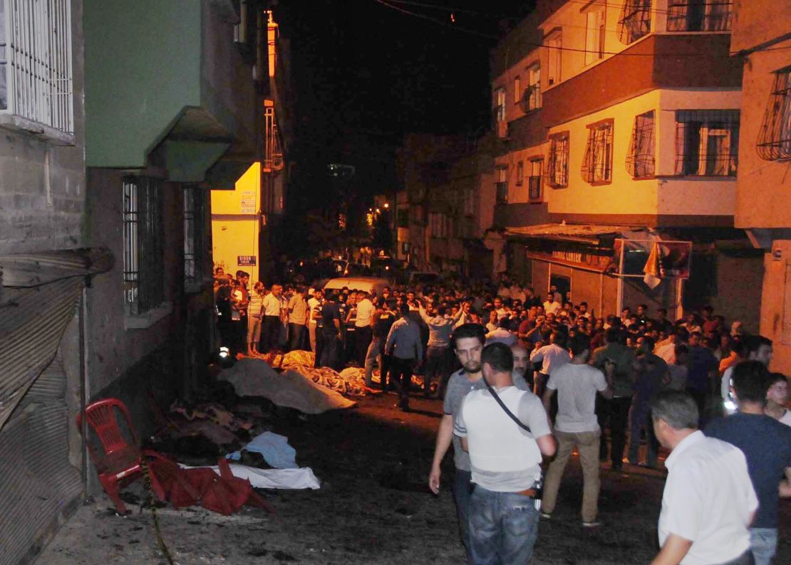 People gather at the scene of an explosion in Gaziantep.