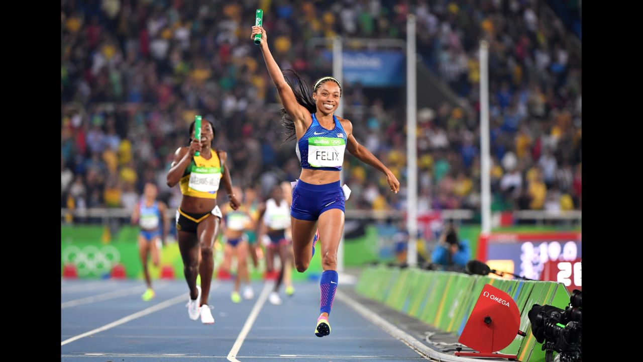 American runner Allyson Felix celebrates as she crosses the finish line to win the women's 4x400-meter relay final on Saturday, August 20. The win gives Felix her 6th career gold.