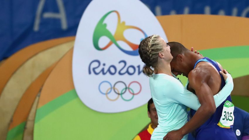 RIO DE JANEIRO, BRAZIL - AUGUST 18:  Ashton Eaton of the United States embraces wife Brianne Theisen-Eaton after the Men's Decathlon 1500m and winning gold overall on Day 13 of the Rio 2016 Olympic Games at the Olympic Stadium on August 18, 2016 in Rio de Janeiro, Brazil.  (Photo by Alexander Hassenstein/Getty Images)