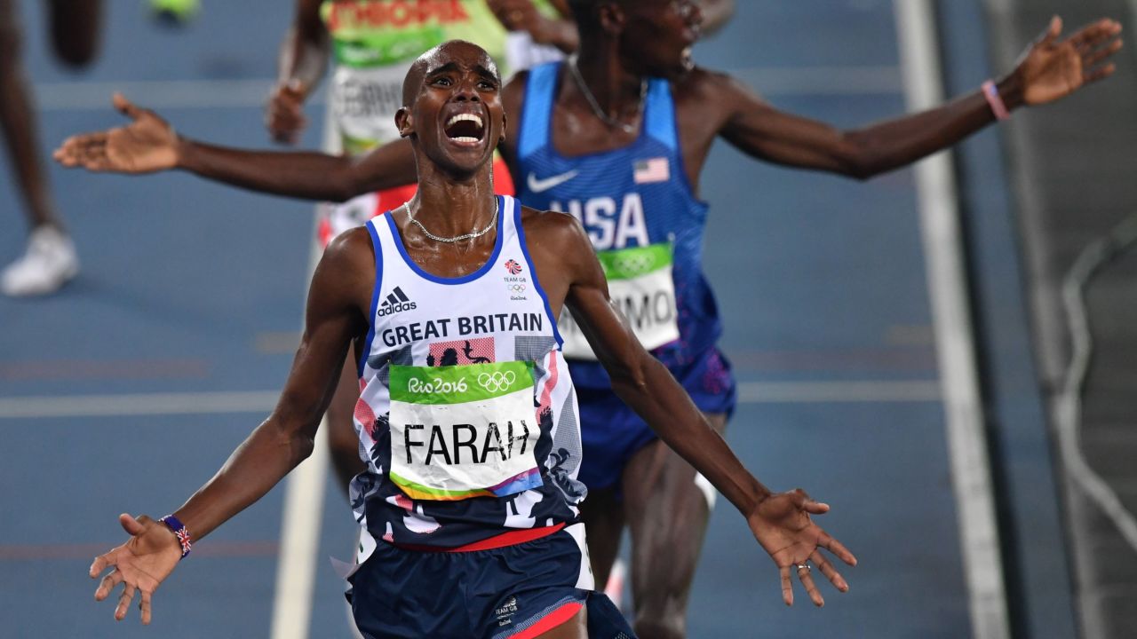 Mo Farah celebrates after crossing the finish line to win the men's 5000m final at Rio 2016.