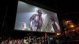 The Tragically Hip's frontman Gord Downie is displayed on a screen during a public viewing of the band's final concert in Halifax, Nova Scotia, Saturday, Aug. 20, 2016. (Darren Calabrese/The Canadian Press via AP)