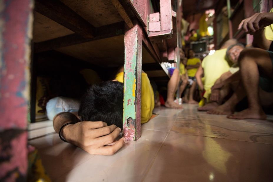 "The food is terrible," says one inmate. "And it's hard to find a space to sleep, especially when it rains."