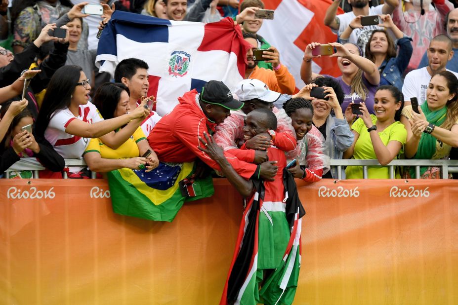 Eliud Kipchoge of Kenya celebrates after earning gold in the marathon.