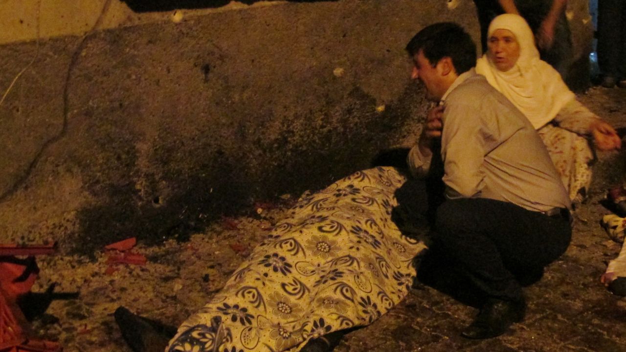 A man mourns a victim of the terror attack at a wedding in Gaziantep, southeastern Turkey.