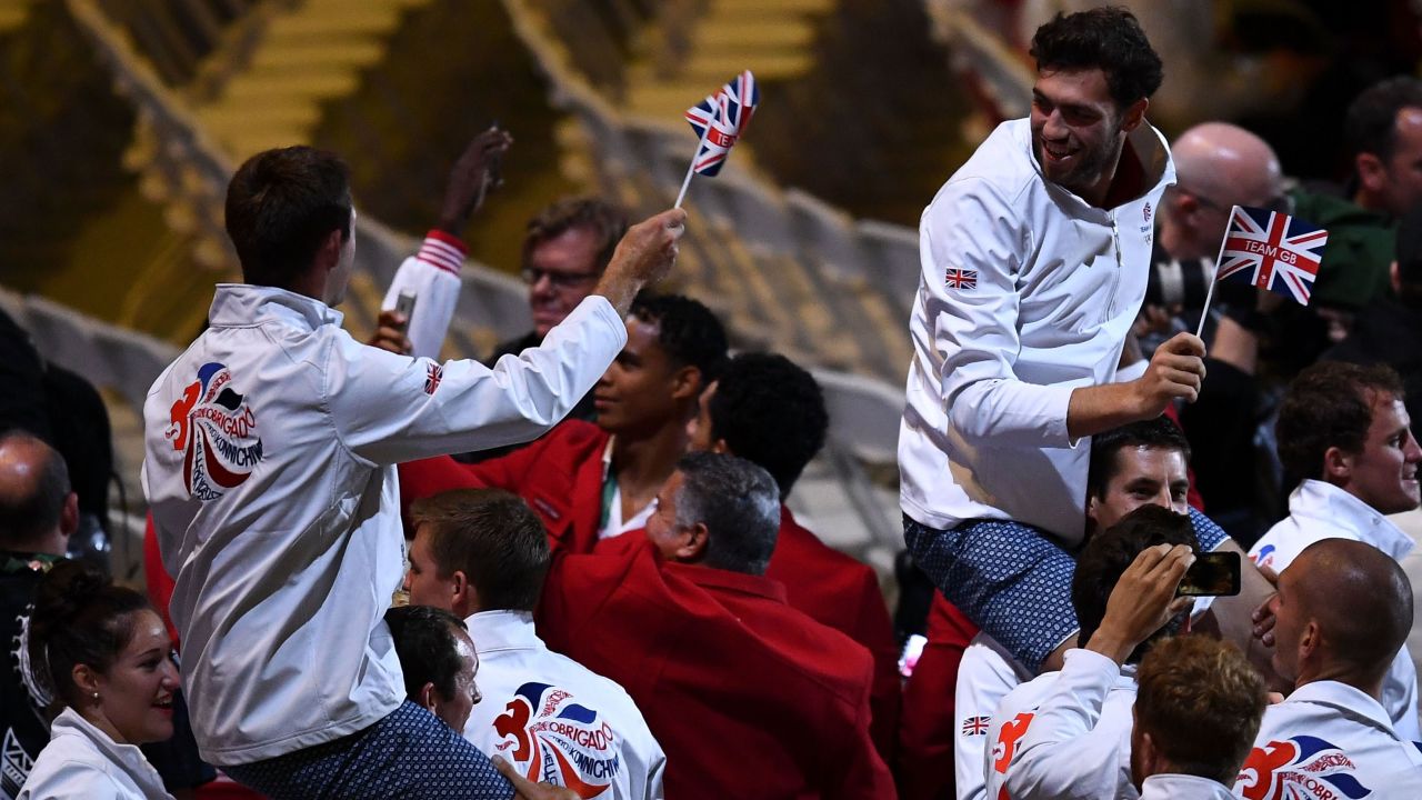 Team Great Britain celebrates during the "Heroes of the Games" segment.