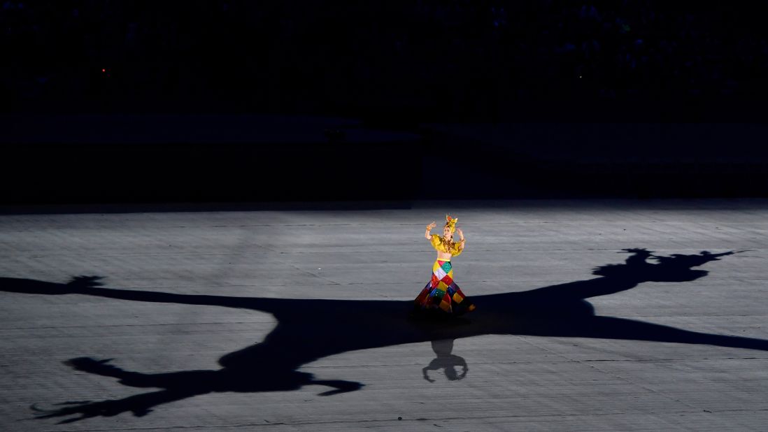 A dancer performs during the closing ceremony.