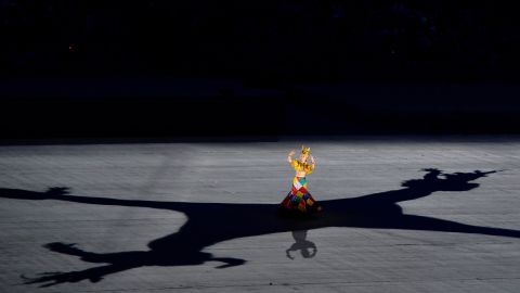 A dancer performs during the closing ceremony.