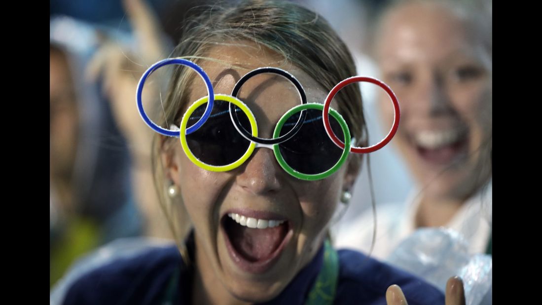 Jackie Briggs from the United States wears Olympic ring sunglasses.
