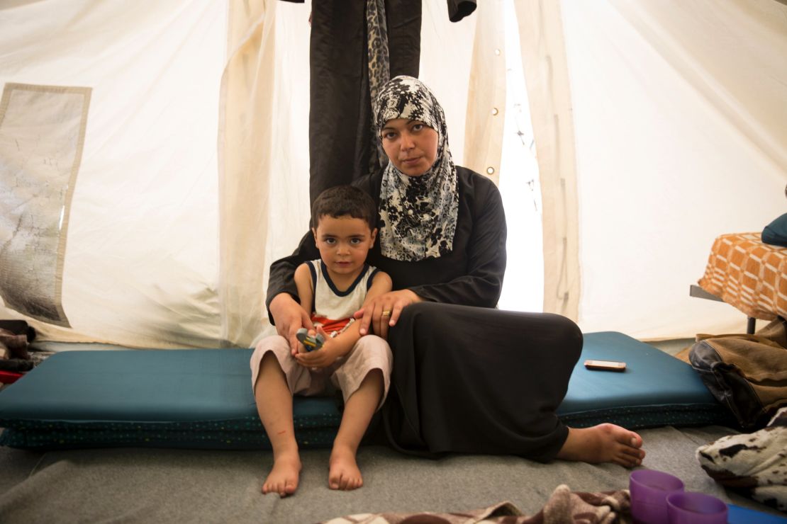 "I didn't want to leave Syria, but our house was destroyed," says Salwa, a 38-year-old teacher from Damascus, Syria, living in Softex Camp in Greece with her three-year-old son Hadi. 