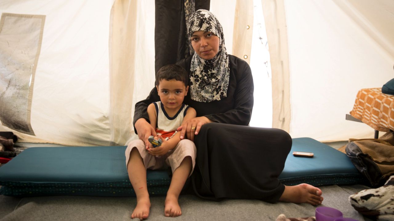 "I didn't want to leave Syria, but our house was destroyed," says Salwa, a 38-year-old teacher from Damascus, Syria, living in Softex Camp in Greece with her three-year-old son Hadi. 